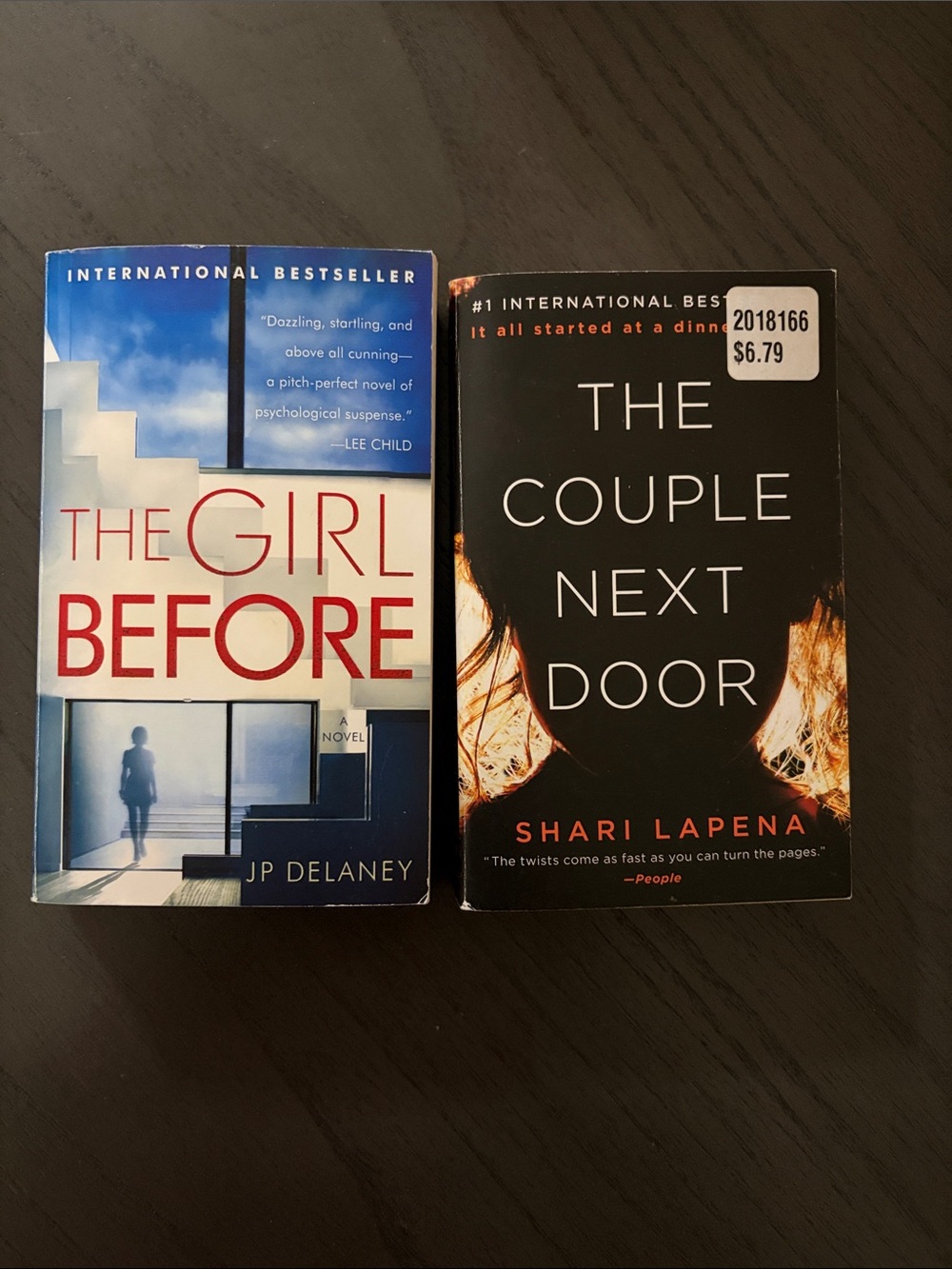 The Couple Next Door – Black Paperback Novel